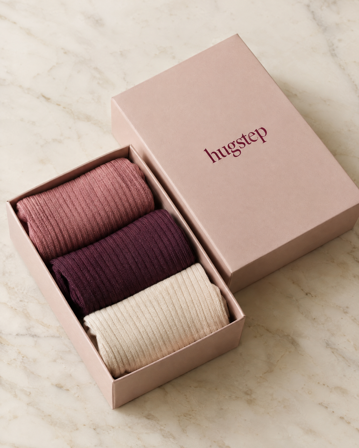 HugStep box with three folded pairs